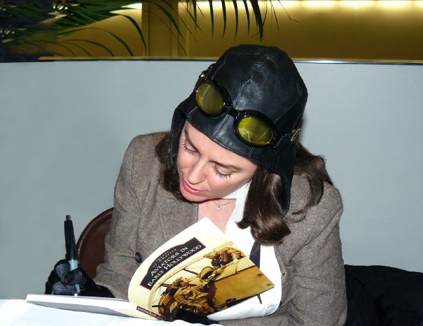 Signing a book for SFO Museum